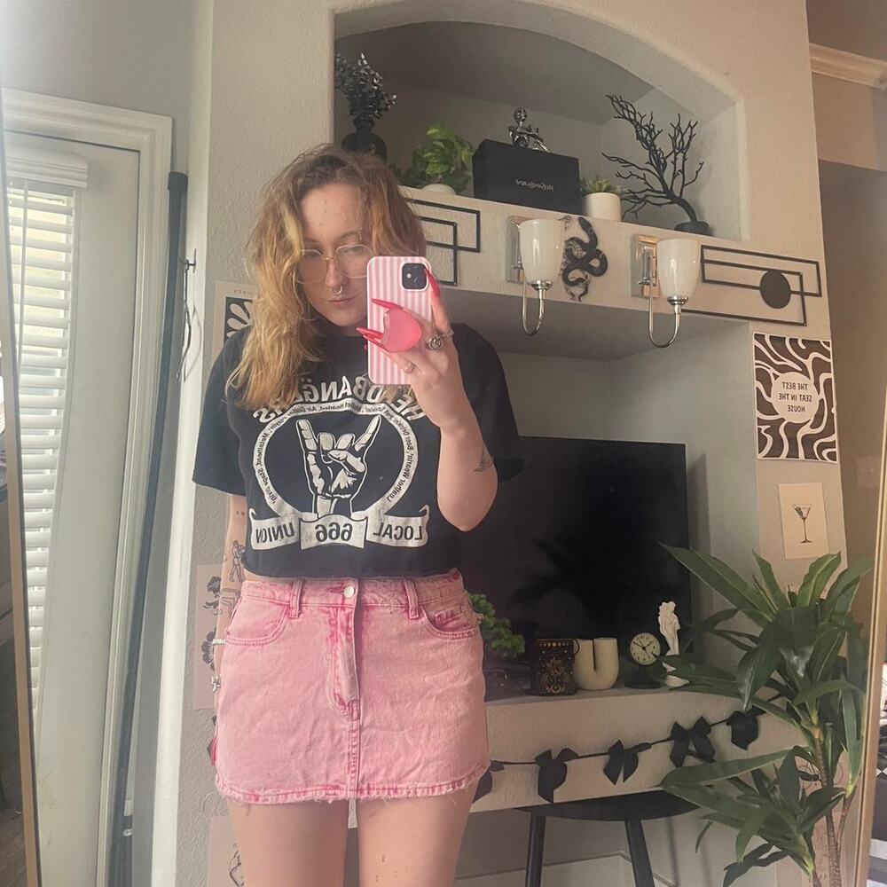 Pink light wash denim mini skirt